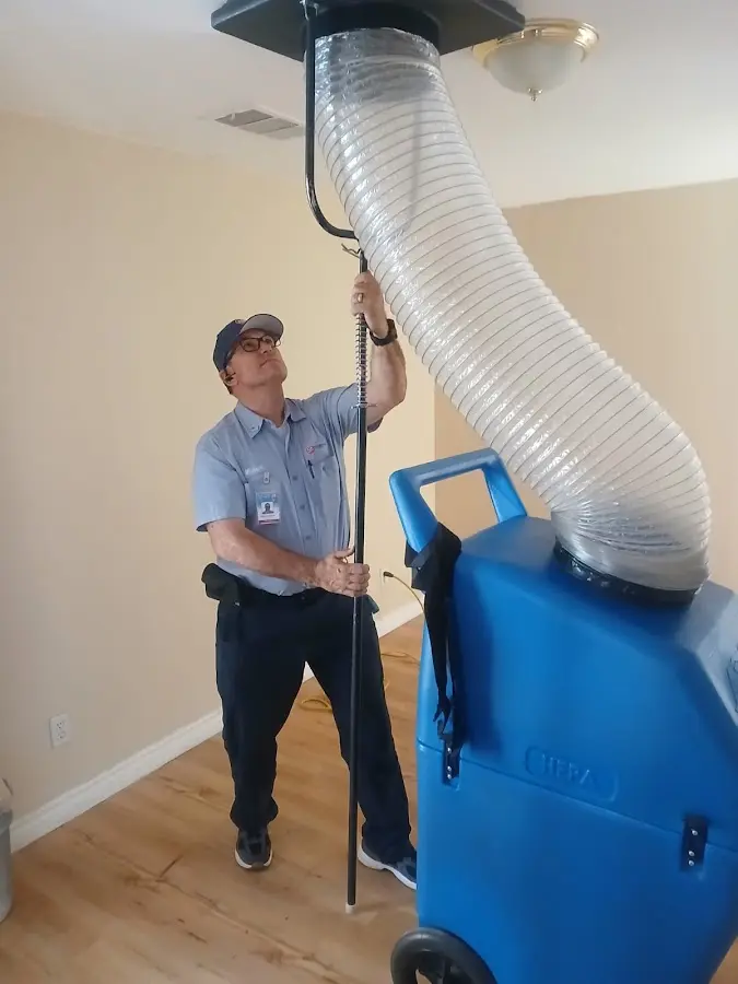 Mini Split Installation technician using HEPA equipment in Hutchinson
